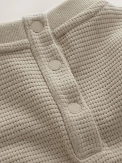 Baker by Ted Baker Textured Long Sleeve Romper^ Rompers & Overalls