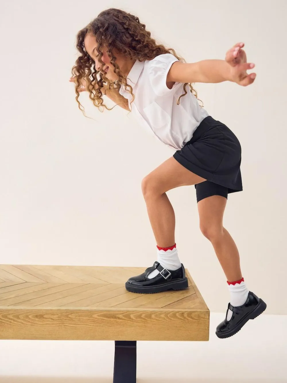 Next Black Cotton Rich Jersey Stretch School Skort (3-16yrs)^ Shorts & Skirts