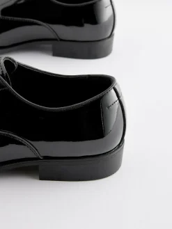 Next Black Standard Fit Patent Oxford Toe Cap Shoes^ Shoes