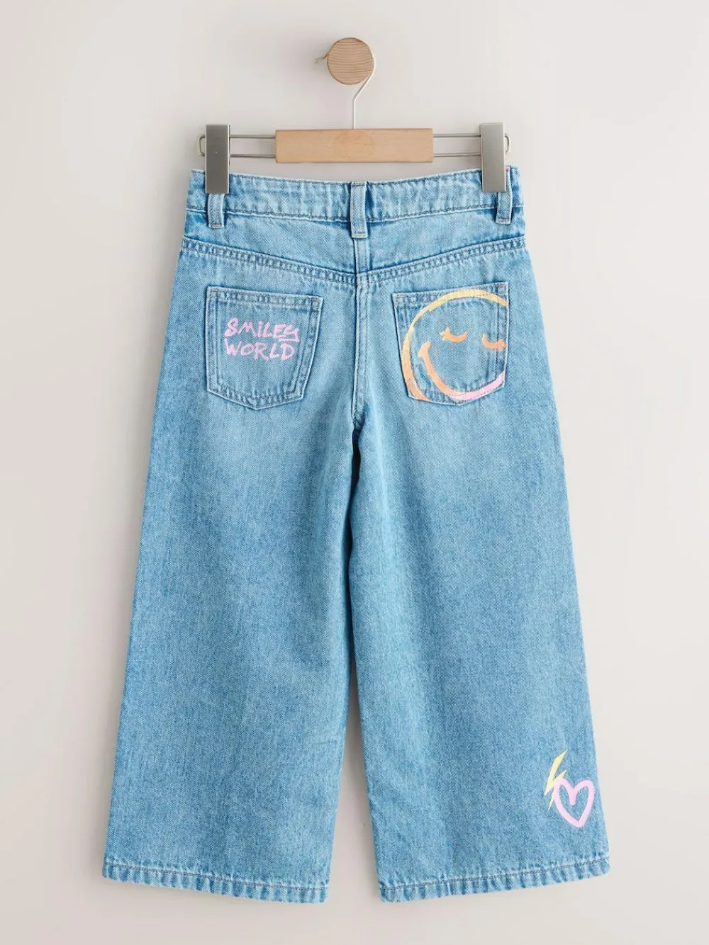 Next Mid Blue SmileyWorld® Print Wide Leg Jeans (3-16yrs)^ Jeans