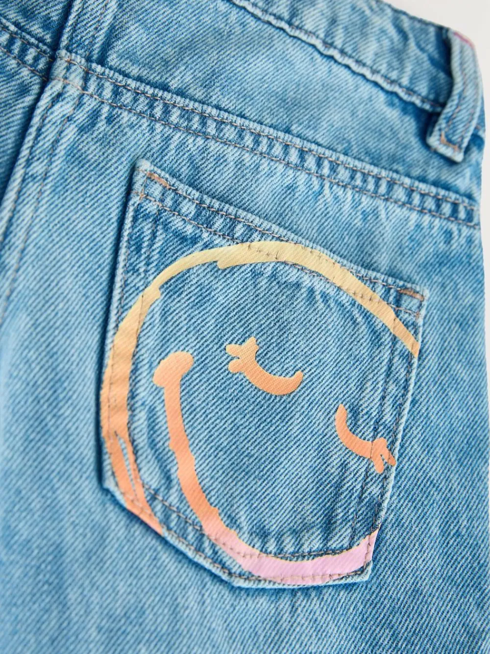 Next Mid Blue SmileyWorld® Print Wide Leg Jeans (3-16yrs)^ Jeans