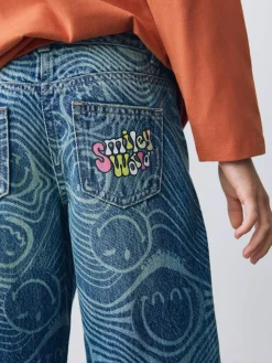 Discount Next Mid Blue SmileyWorld® Print Wide Leg Jeans (3-16yrs)
