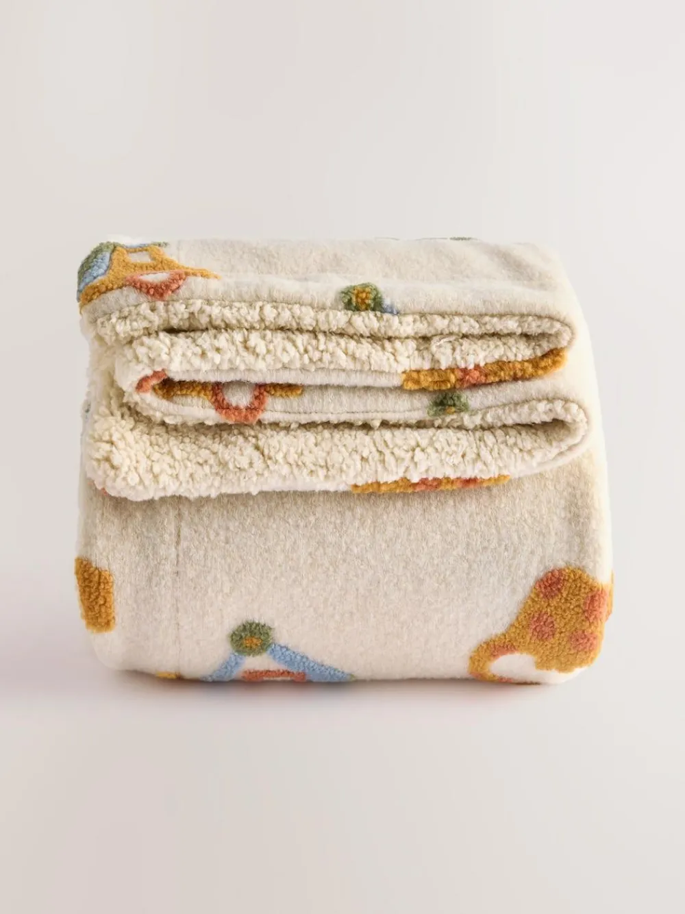 Next Neutral Tufted Dinosaurs & Diggers Borg Throw Blanket^ Cushions & Throws