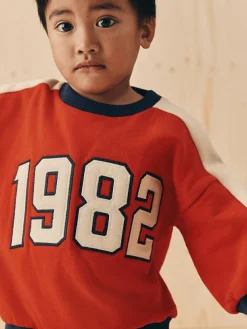 Discount Next Red 1982 All-Over Print Crew Neck Sweatshirt (3mths-7yrs)