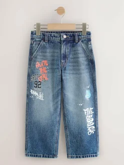 Next Varsity All-Over Print Mid Blue Denim Wide Fit Authentic Jeans (3-16yrs)^BOY Jeans|Jeans