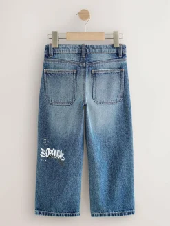 Next Varsity All-Over Print Mid Blue Denim Wide Fit Authentic Jeans (3-16yrs)^BOY Jeans|Jeans